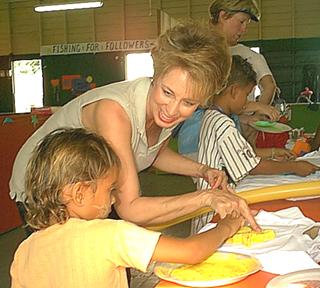 Brenda works with a child
