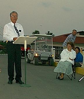 Brother Wilson Howell preaches on the bridge
