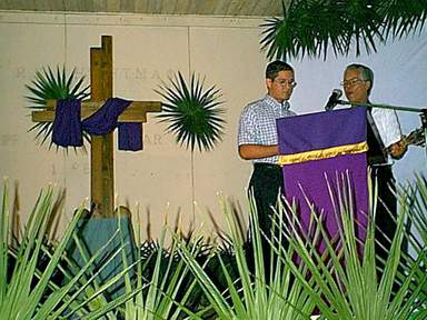 Brother Wilson Howell and son Marley open the program 