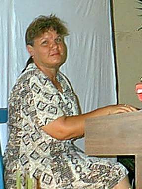 Sister Mary Hill accompanies on the organ
