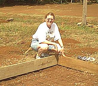 Glenda checks the wire mesh
